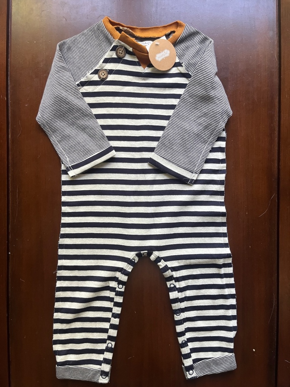 Mud Pie Navy and Cream Striped One-Piece with Mustard Neck Trim